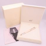 A Montblanc/Mont Blanc Princess Grace de Monaco ivory coloured rollerball pen, boxed with papers.