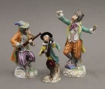 Three Continental monkey band figurines. The largest 16 cm high.
