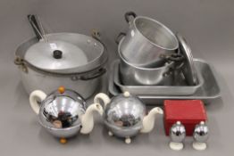 A quantity of vintage AGA cooking pots and two Kosy Kraft teapots.