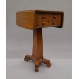 An early 19th century mahogany pedestal Pembroke work table. 33.5 cm wide flaps down.