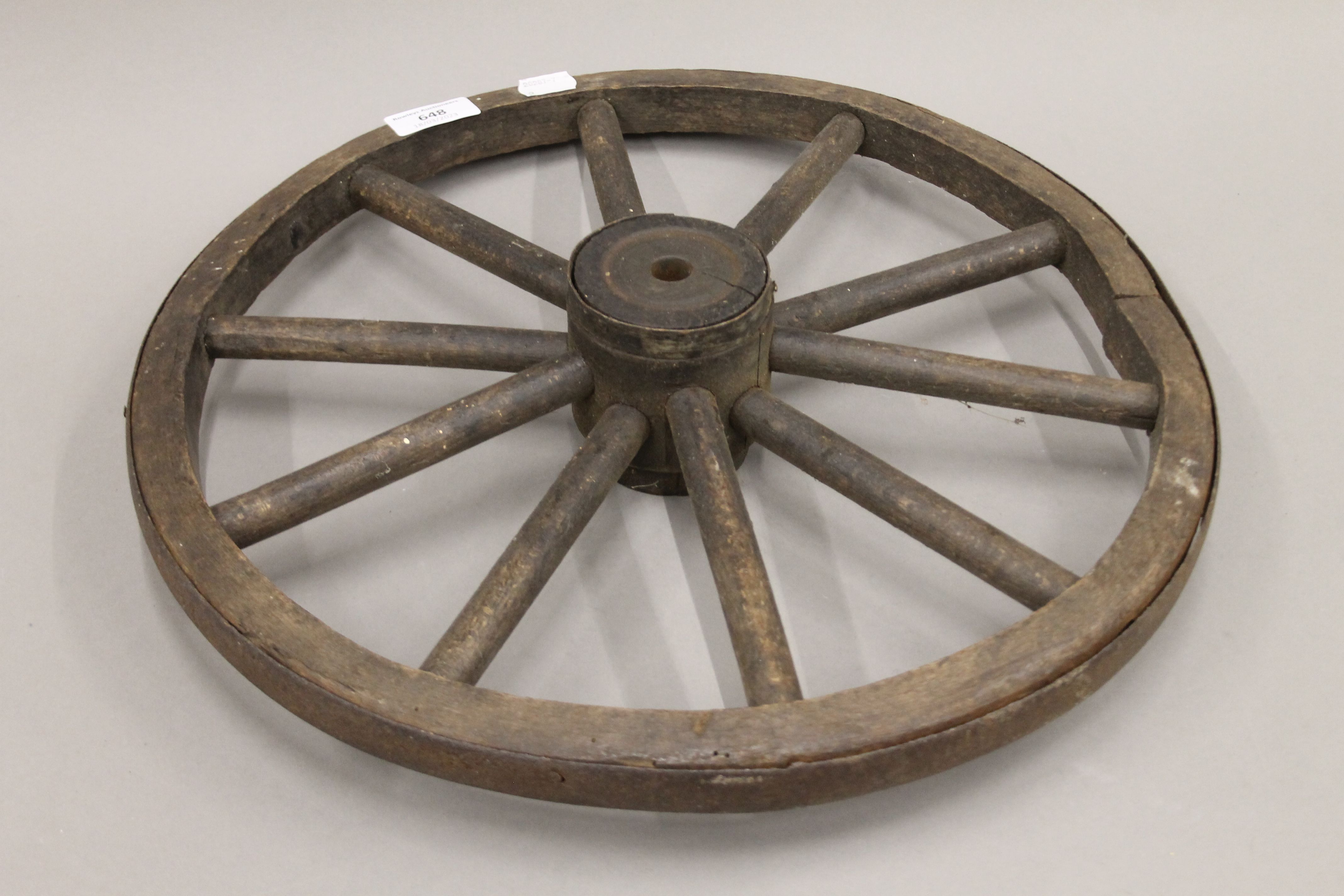 Two small antique iron mounted wooden wheels. 42 cm diameter. - Image 2 of 4