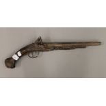 An antique flintlock pistol. 51 cm long.