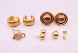 Three pairs of 9 ct gold earrings and a tie clip. Circular earrings 2.5 cm diameter. 15.6 grammes.