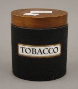A vintage Dunhill tobacco box. 11 cm high.