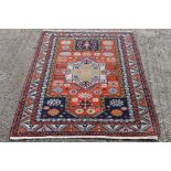 A Turkish blue ground rug. 197 x 115 cm.