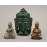 Three hardstone models of Buddha. The largest 10 cm high.