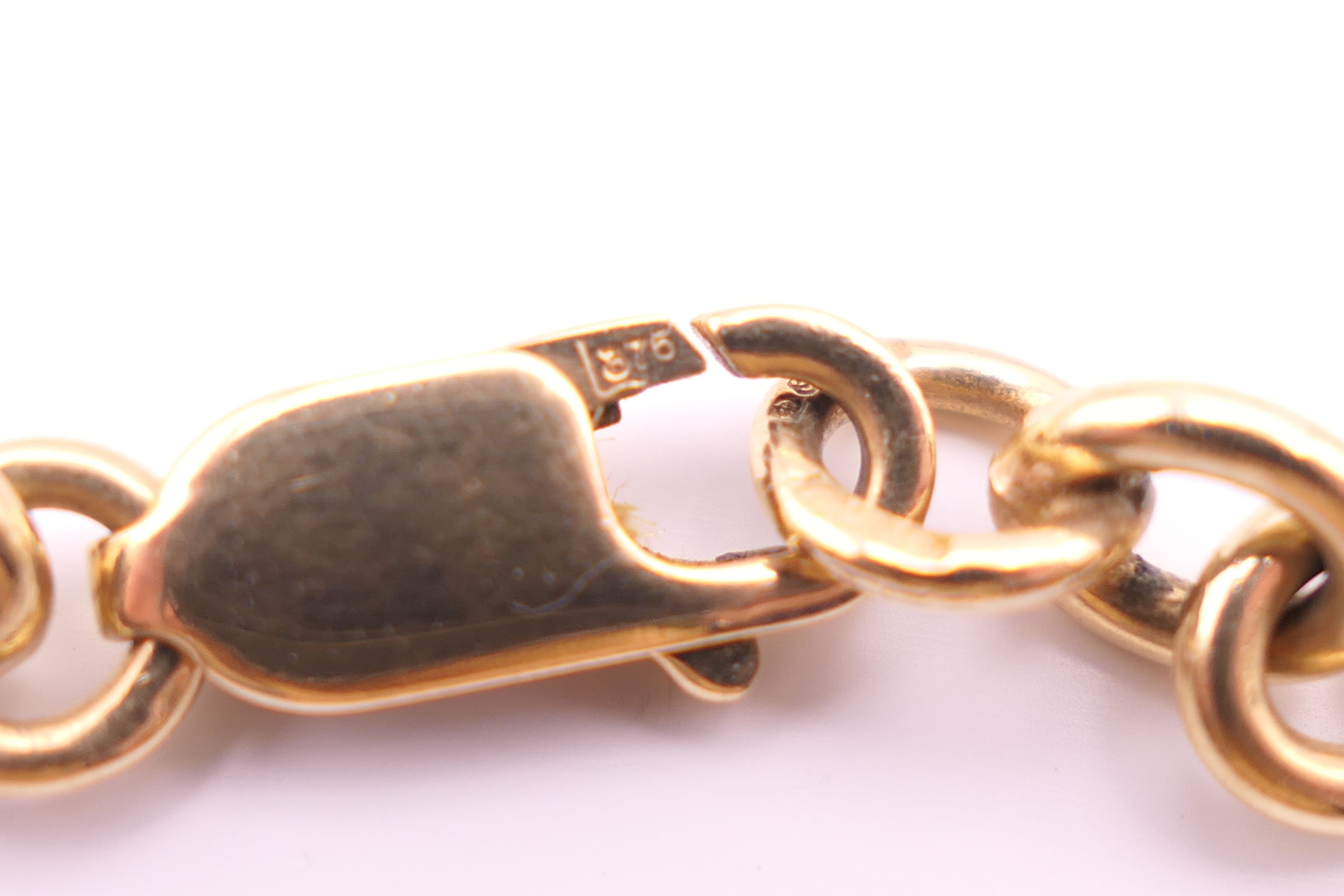 A 9 ct gold watch chain, converted to a necklace. 40.5 cm long. 29.9 grammes. - Image 5 of 5