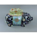 A Chinese porcelain pig tureen. 38 cm long.
