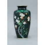 A green cloisonne vase. 15 cm high.