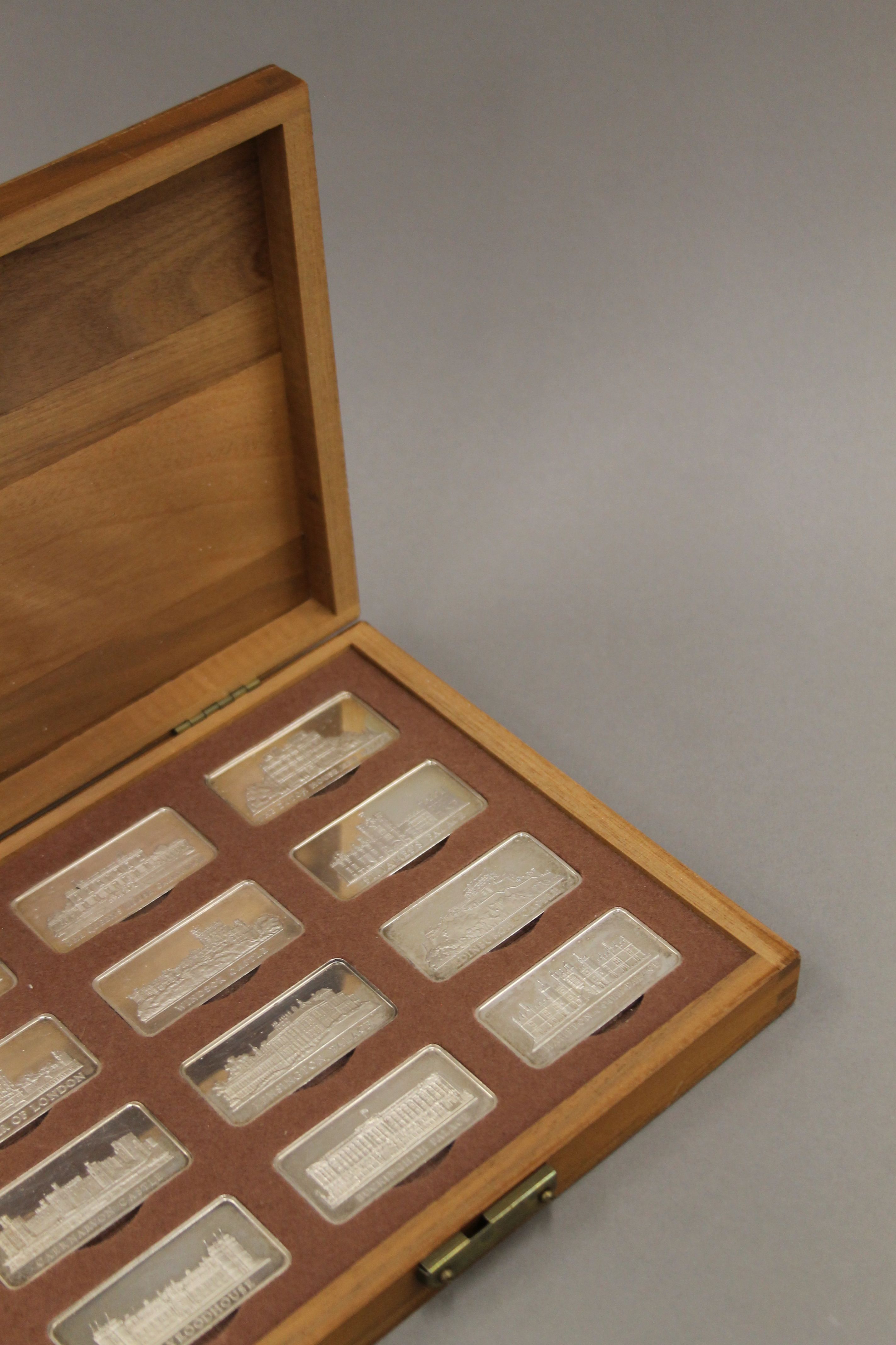 A boxed set of 12 Royal Palaces silver ingots. Each 31.3 grammes. - Image 3 of 5