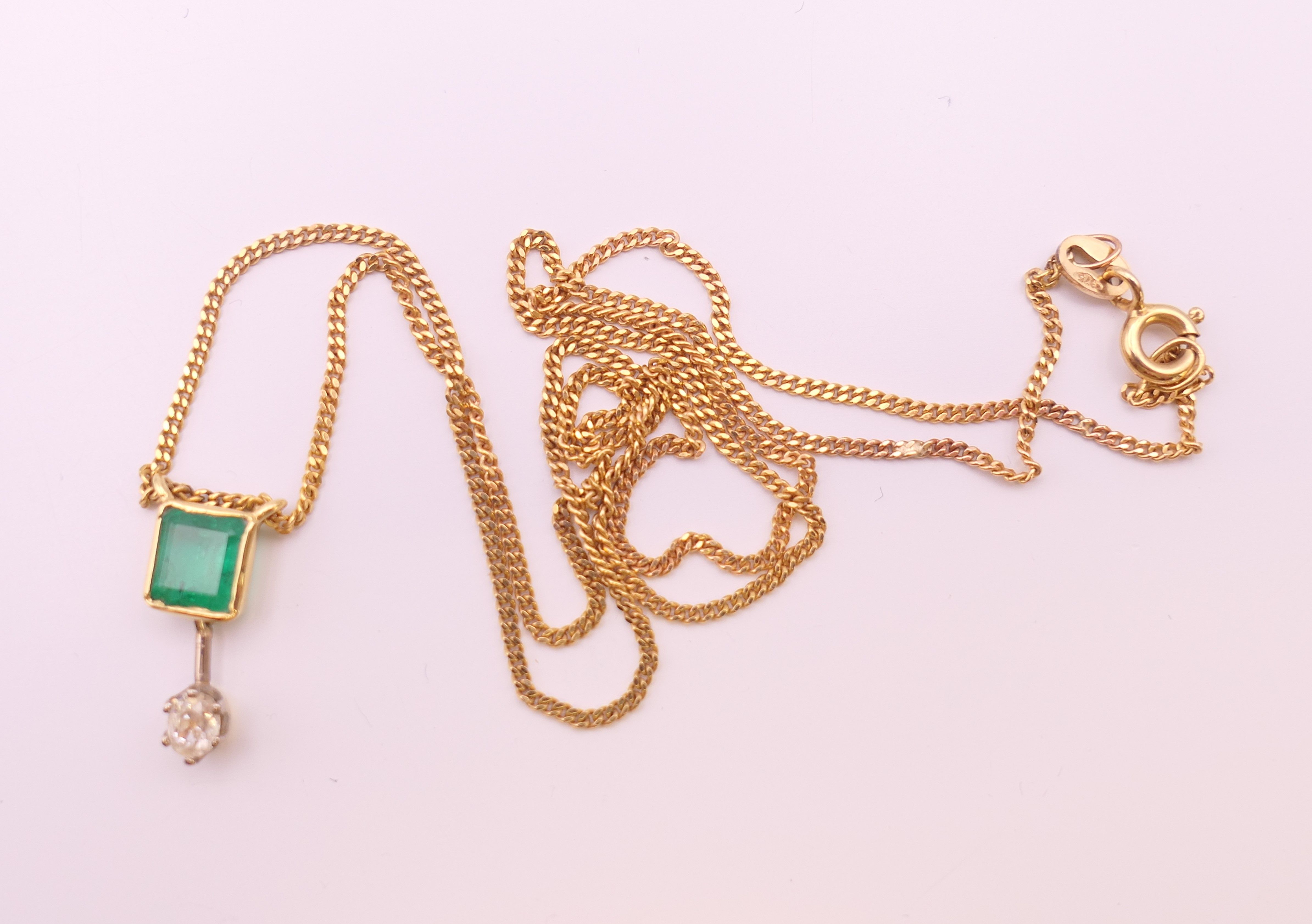 A 9 ct gold, emerald and diamond pendant necklace with matching earrings. Pendant 1. - Image 5 of 8