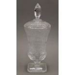 An Irish cut lead crystal lidded vase. 33 cm high.