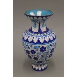 A Multan turquoise, blue and white pottery vase.