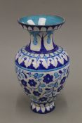 A Multan turquoise, blue and white pottery vase.