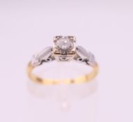 An 18 ct gold solitaire diamond ring. Ring size L. 2.8 grammes total weight.