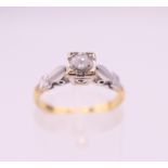 An 18 ct gold solitaire diamond ring. Ring size L. 2.8 grammes total weight.