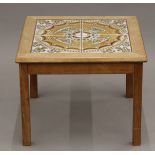 A Danish tile top coffee table. 51.5 cm squared.