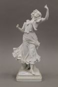 A 19th century bisque porcelain figure of a girl. 35.5 cm high.