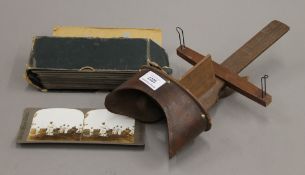 A stereo viewer and military cards.