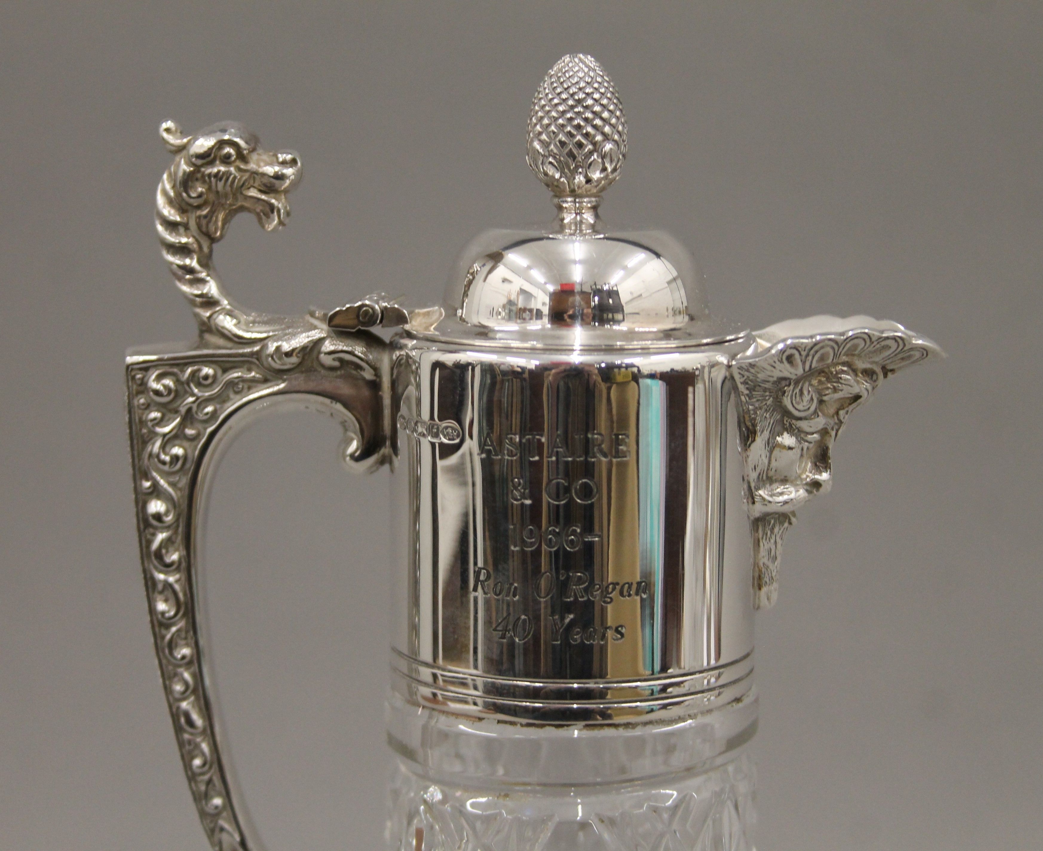 A pair of silver mounted cut glass claret jugs. 30.5 cm high. - Image 4 of 6