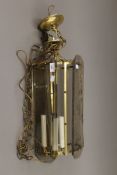 A glass and brass lantern. 60 cm high.