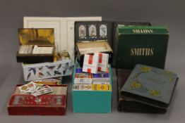 A large collection of vintage cigarette cards.