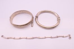 Three silver bracelets. 60.6 grammes.