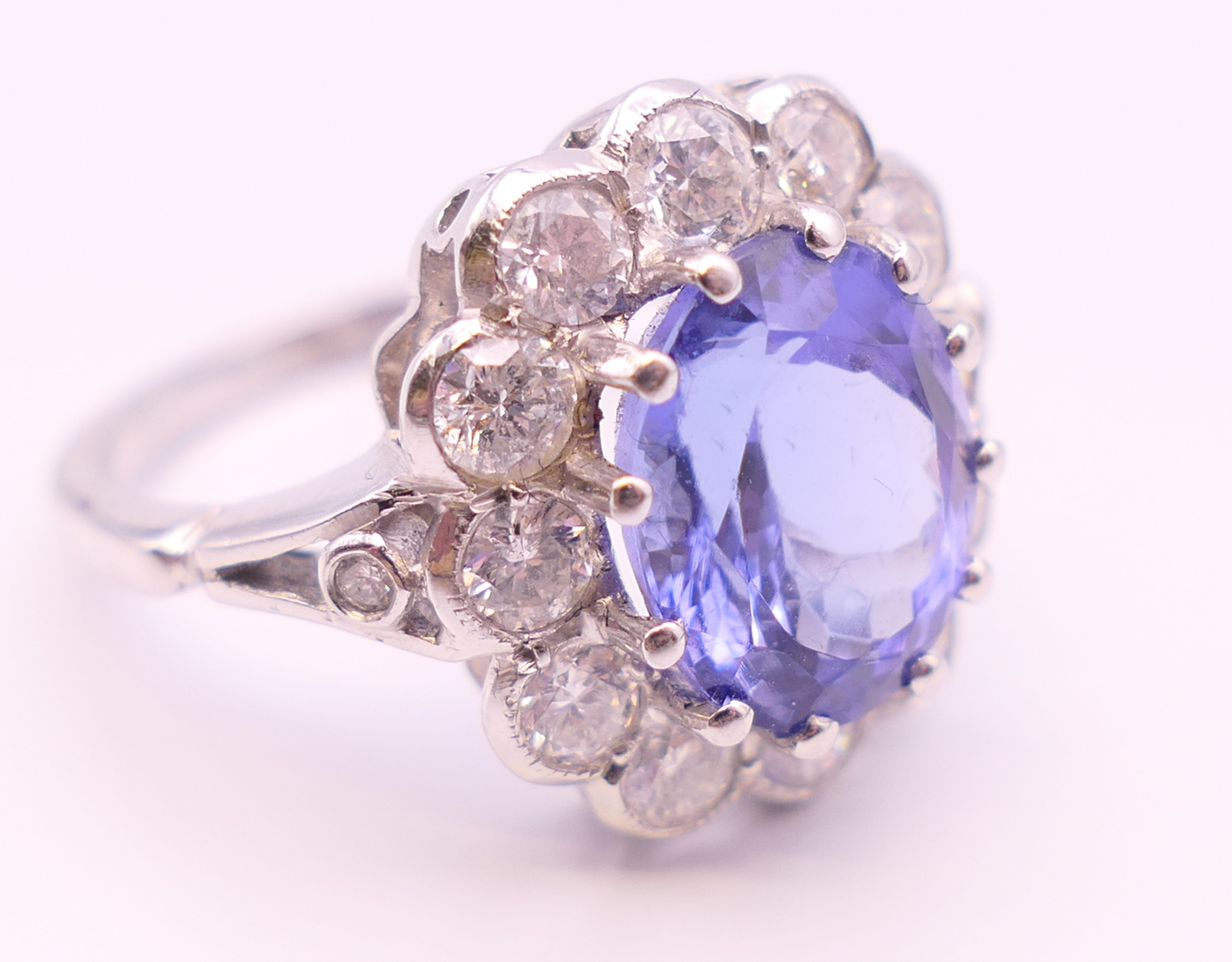An 18 ct white gold ring with central tanzanite of 2. - Image 6 of 8
