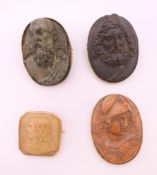 Four antique gold mounted carved stone classical portrait brooches. Three 3.5 cm high, the other 2.