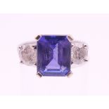 An 18 ct white gold, diamond and tanzanite ring. The tanzanite approximately 3.