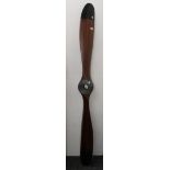 A wooden propeller. Approximately 198 cm high.