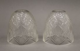 A pair of Victorian glass light shades. 12 cm high.