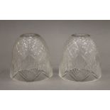 A pair of Victorian glass light shades. 12 cm high.