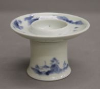 A Chinese blue and white porcelain brush washer. 6.5 cm high.