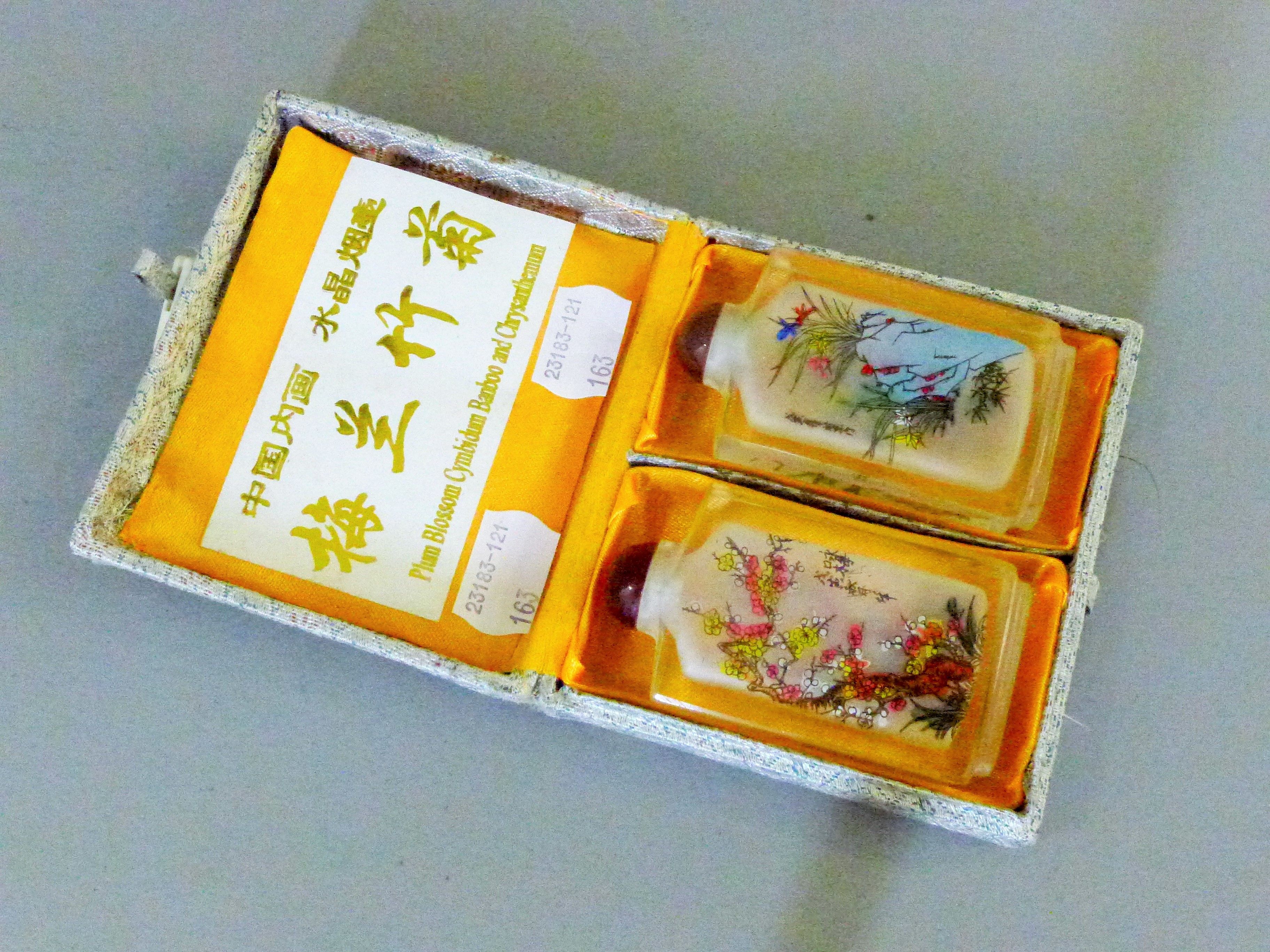 A pair of Chinese reverse painted snuff bottles.