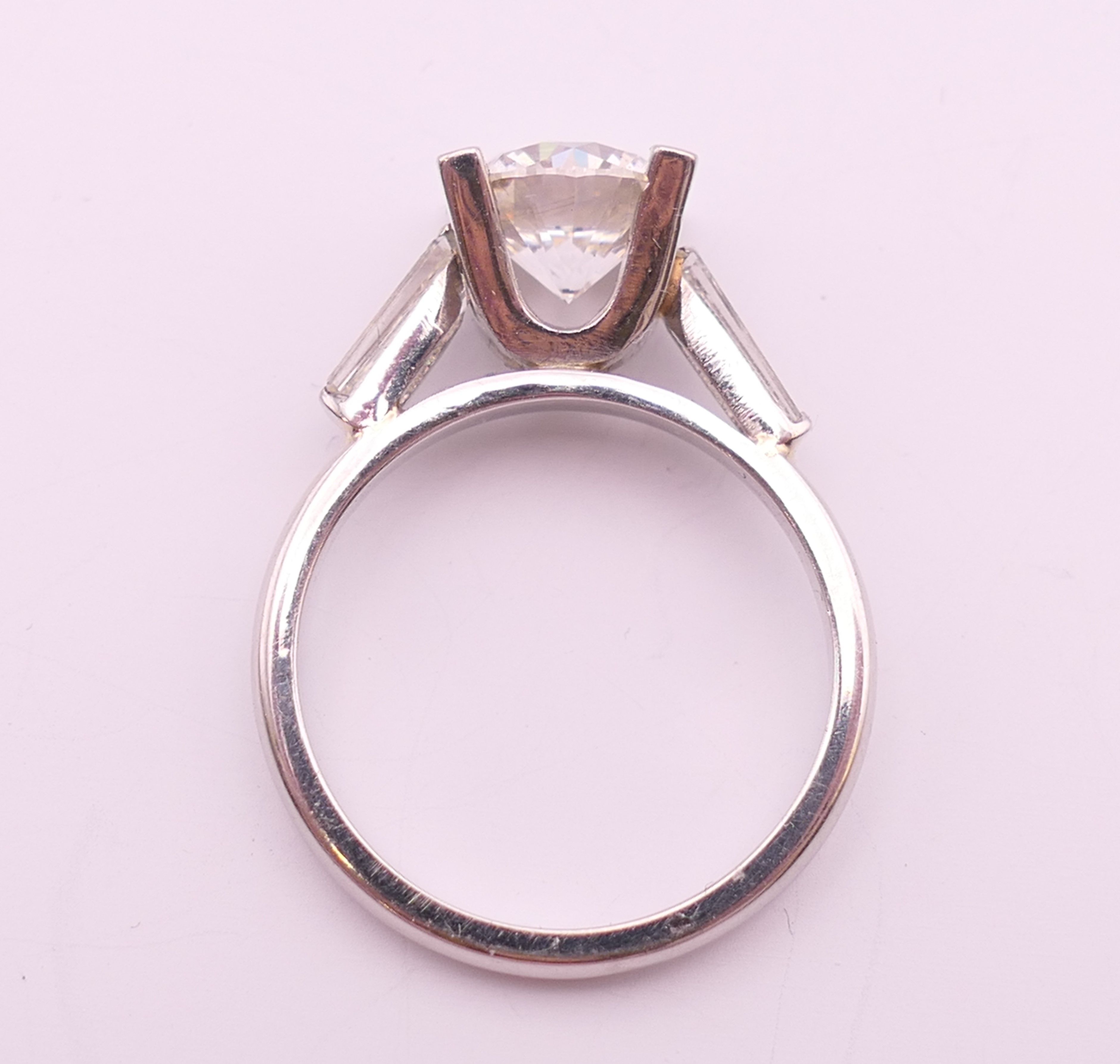 A platinum and diamond ring, - Image 6 of 7