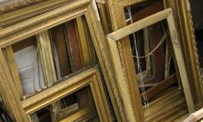 A quantity of various picture frames.