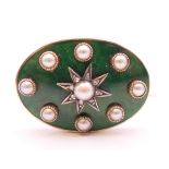 A gold, pearl and green enamel brooch, cased. 2.5 cm x 1.75 cm. 7.9 grammes total weight.