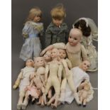 Two boxes of porcelain dolls by Betty Hampton.