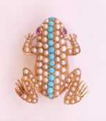 A cased 18 ct gold pearl, turquoise and ruby frog form brooch. 2.5 cm long. 4.