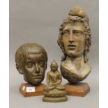 Two busts and a model of Buddha. The largest 41 cm high.