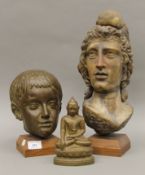 Two busts and a model of Buddha. The largest 41 cm high.
