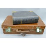 A vintage suitcase and a Bible. The case 55 cm wide.