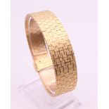 A 9 ct gold bracelet. 18.5 cm long. 42.5 grammes.