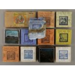 A box of boxed sets of magic lantern slides Boer War, etc.