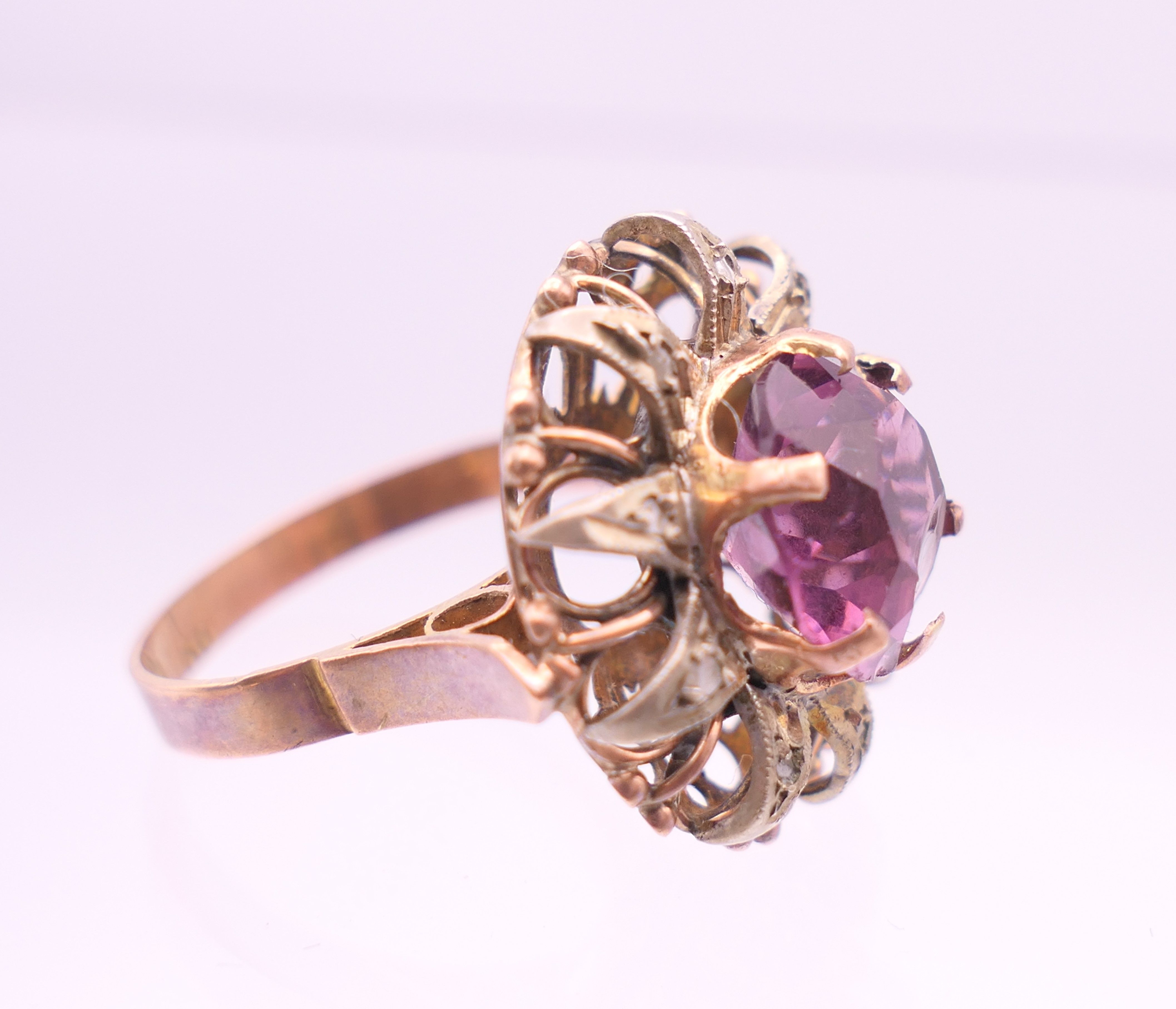 A 9 ct gold, amethyst and diamond flowerhead ring. Ring size Q. - Image 4 of 6