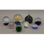 A collection of paperweights.