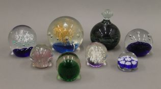 A collection of paperweights.