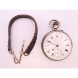 A silver pocket watch.