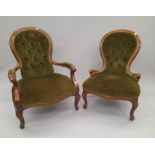 A pair of Victorian his and her's button upholstered spoon back salon chairs.